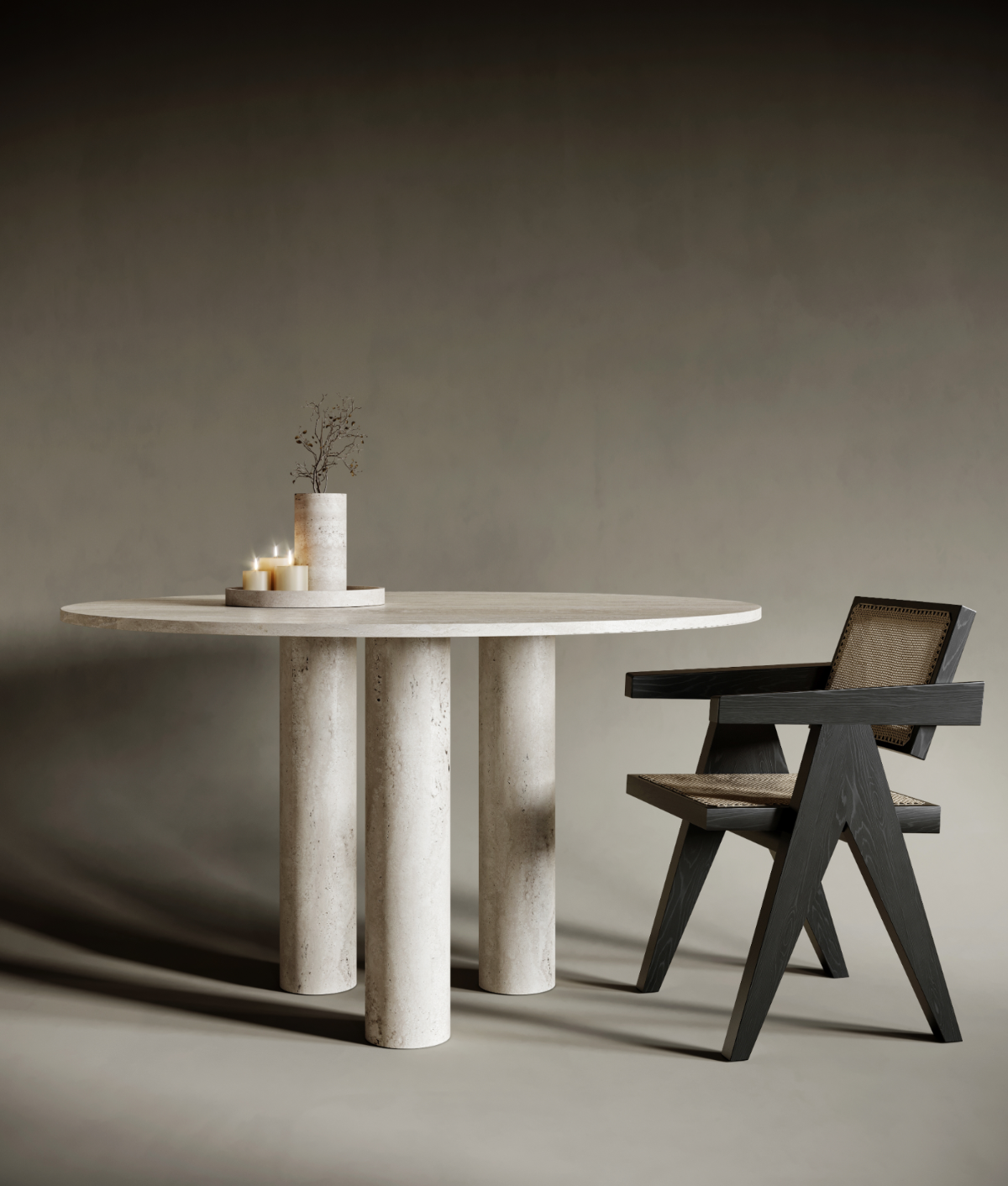 Round travertine dining table with three evenly spaced solid stone legs, showcasing a balanced structure and artisanal stonecraft; its radial symmetry and timeless design make it suitable for both contemporary and transitional interiors.