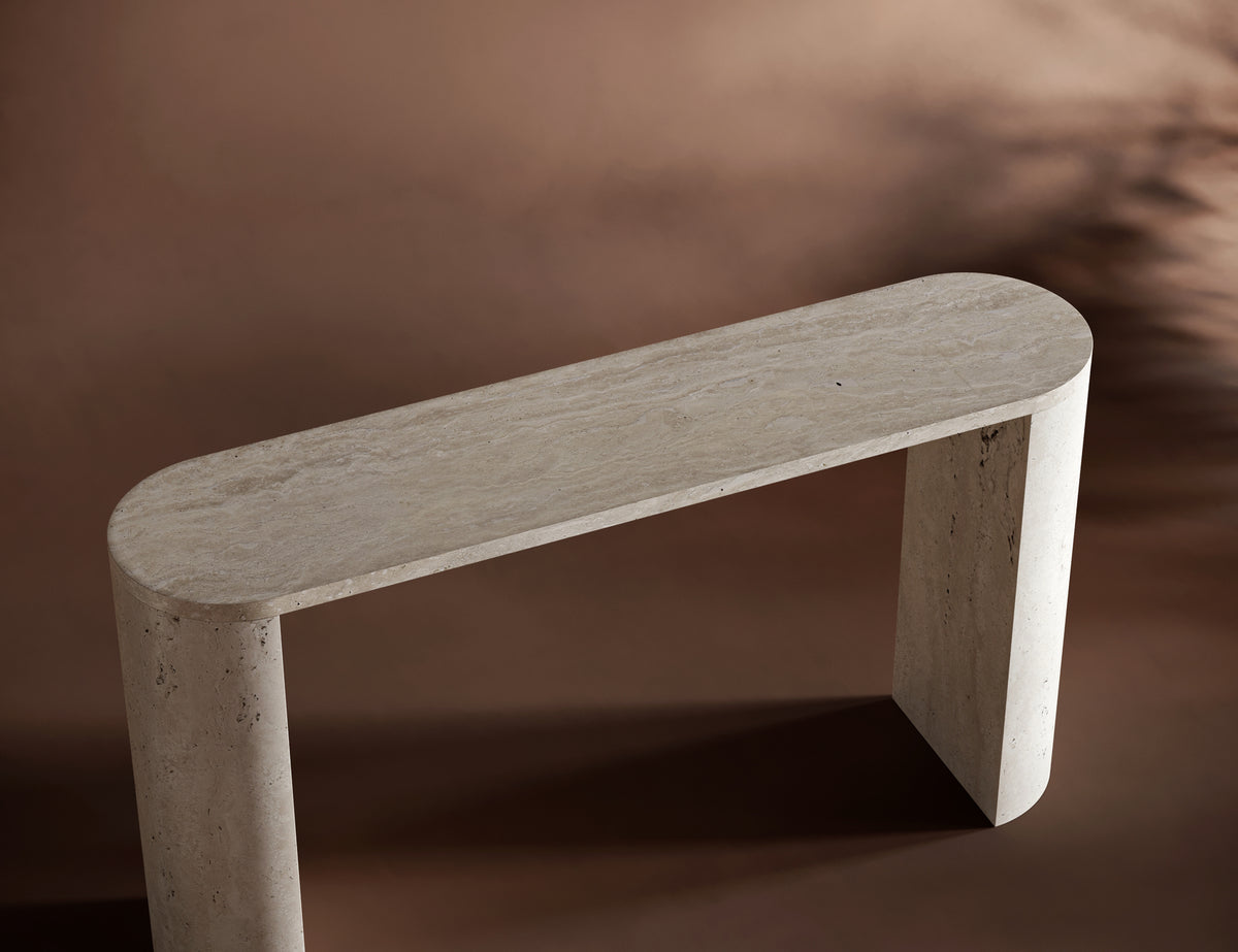Minimalist interior featuring the BEATRICE travertine console table by Bedu Atelier.