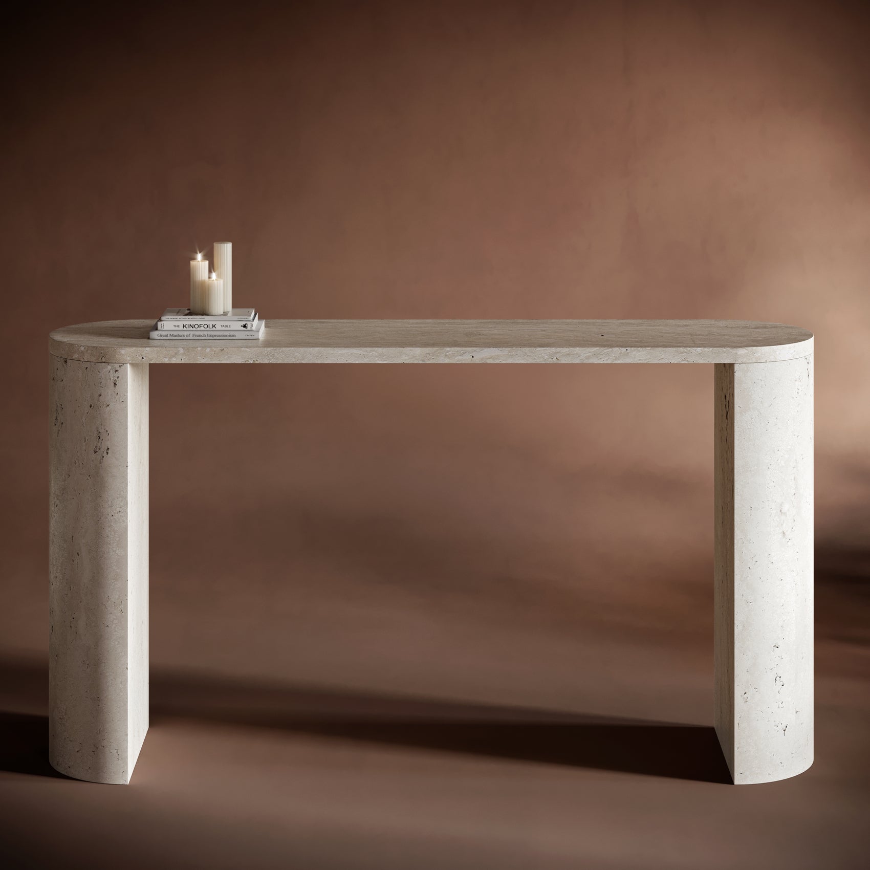 Close-up of BEATRICE travertine console table’s curved legs and natural stone texture.