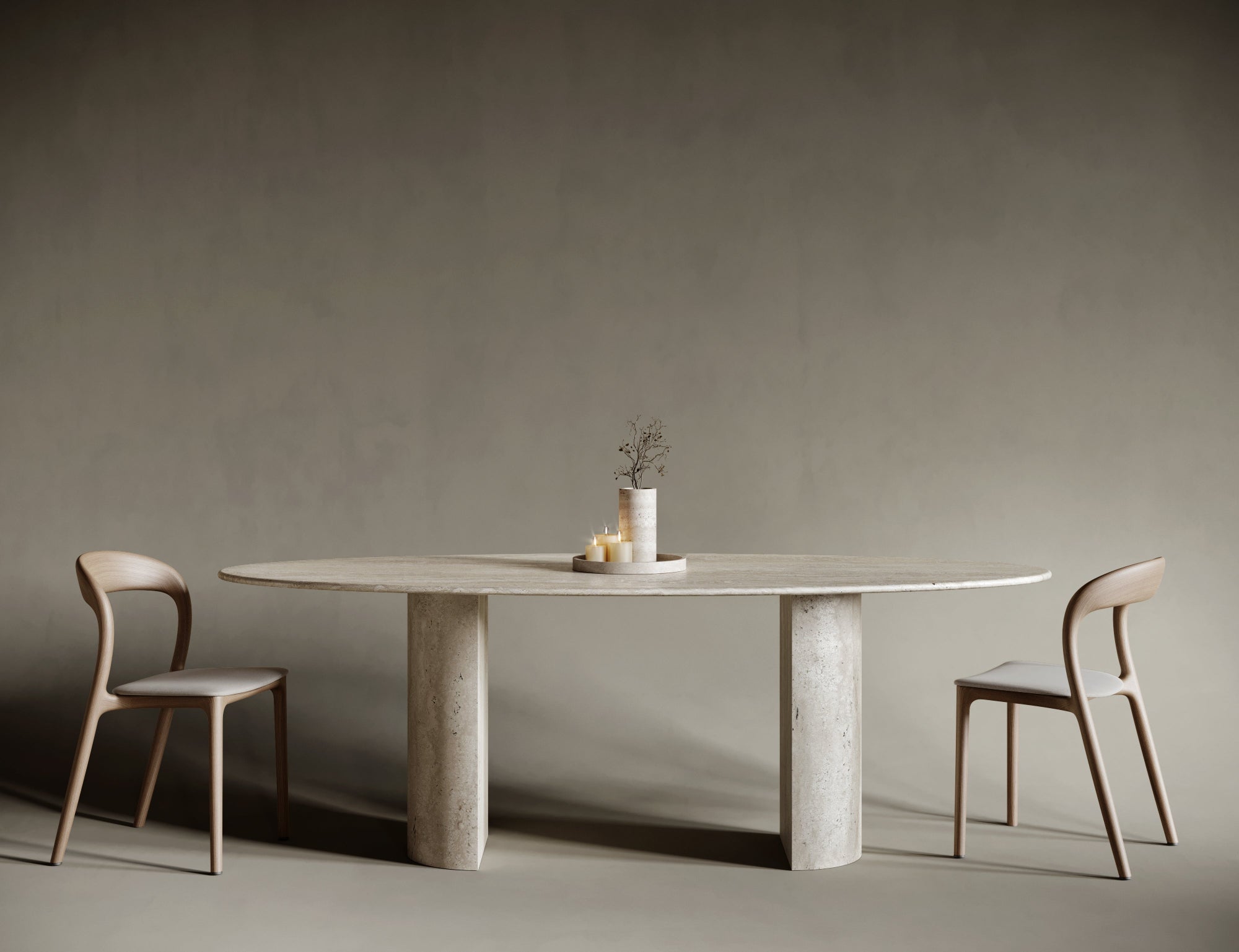 Contemporary ellipse travertine dining table with a sculptural semi-cylindrical base, highlighting soft curvature and asymmetrical balance; crafted from honed travertine with rich texture, perfect for design-led interior spaces.