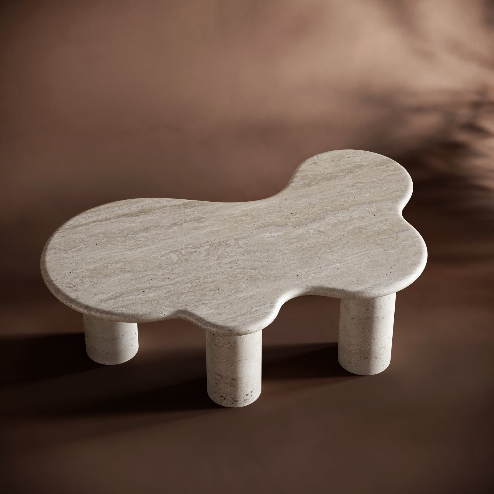 Close-up of ISABELLA coffee table’s free-flowing tabletop, highlighting its unique organic design.
