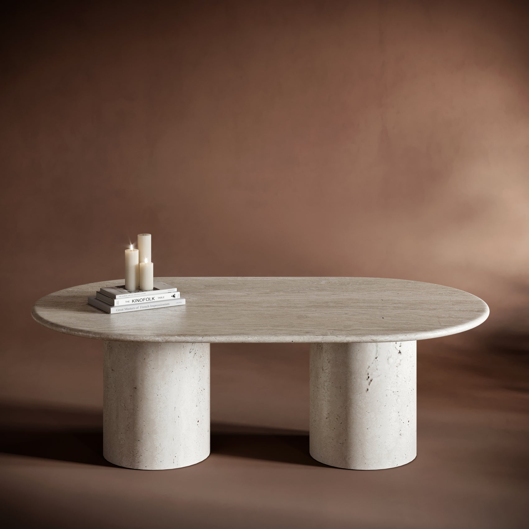 MATTEO travertine coffee table with an oval top and cylindrical bases, showcasing natural stone textures.