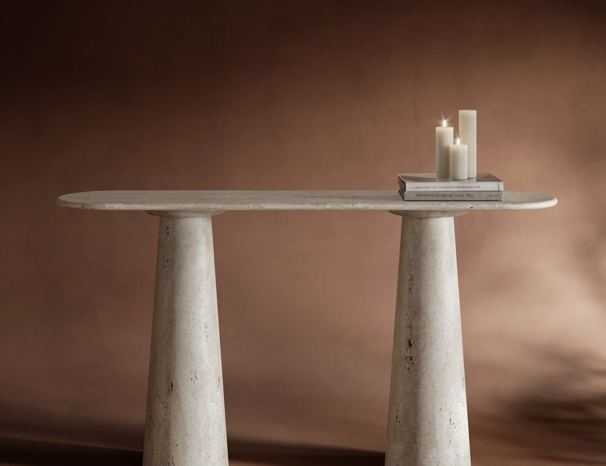 Elegant oval travertine console table with conical leg, minimalist travertin furniture design, natural stone surface, ideal as console travertin decor, timeless oval travertine dining piece.