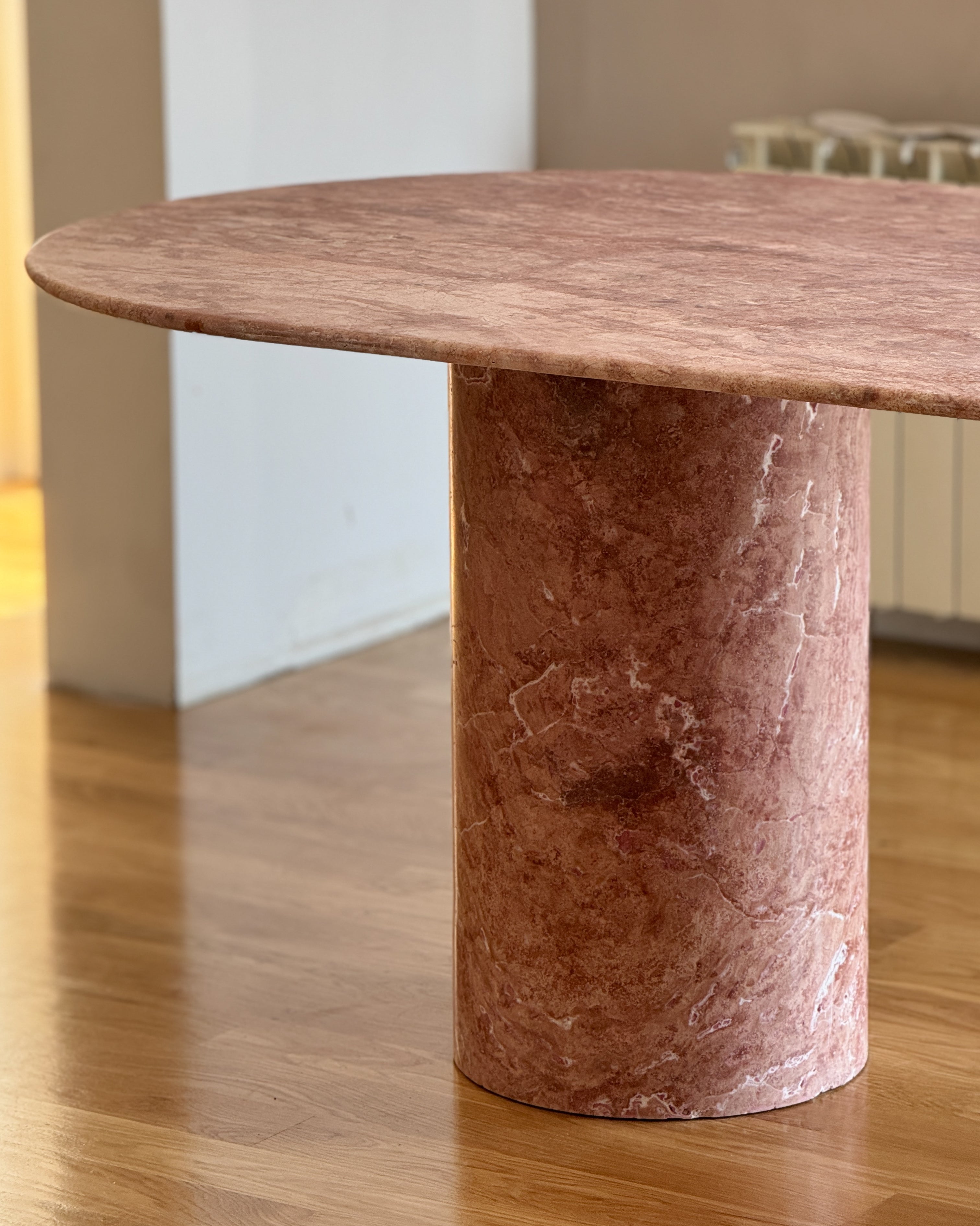 bold travertin design red table