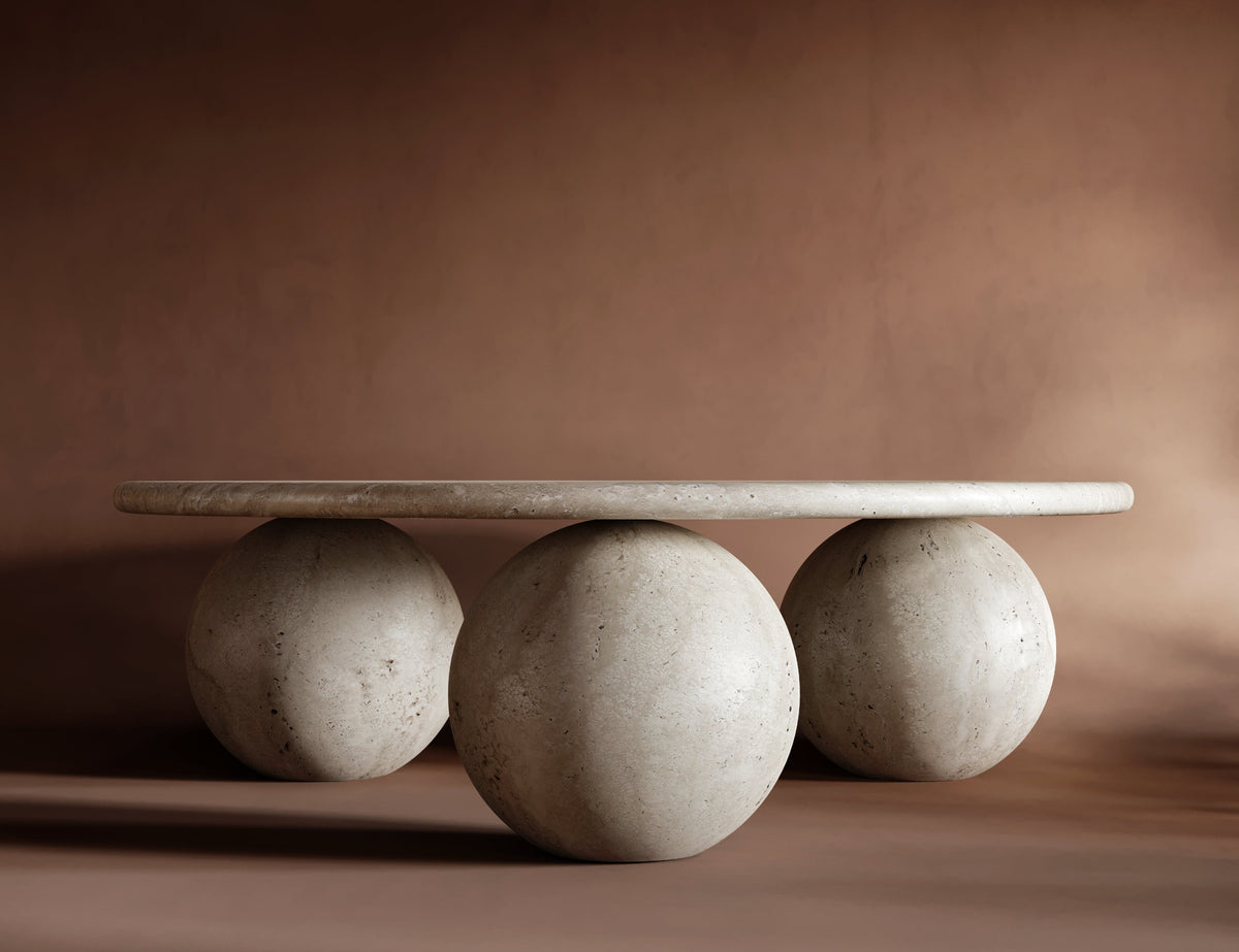 Round travertine coffee table with three ball base, sculptural modern design, stone center table look, 3 ball travertin style, natural finish for elegant interiors.