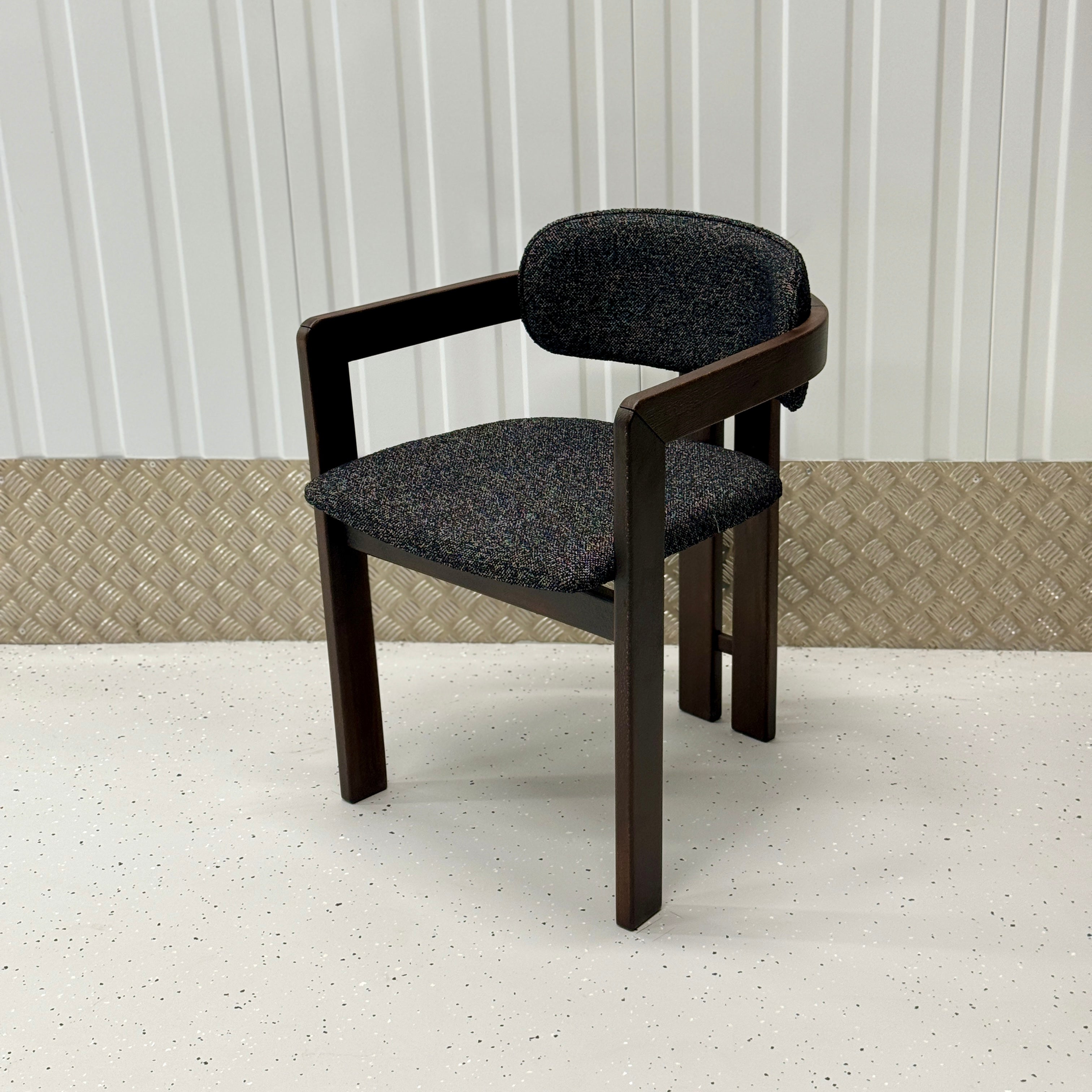 Elegant wooden dining chair with a T-shaped backrest, ideal for pairing with luxury dining tables