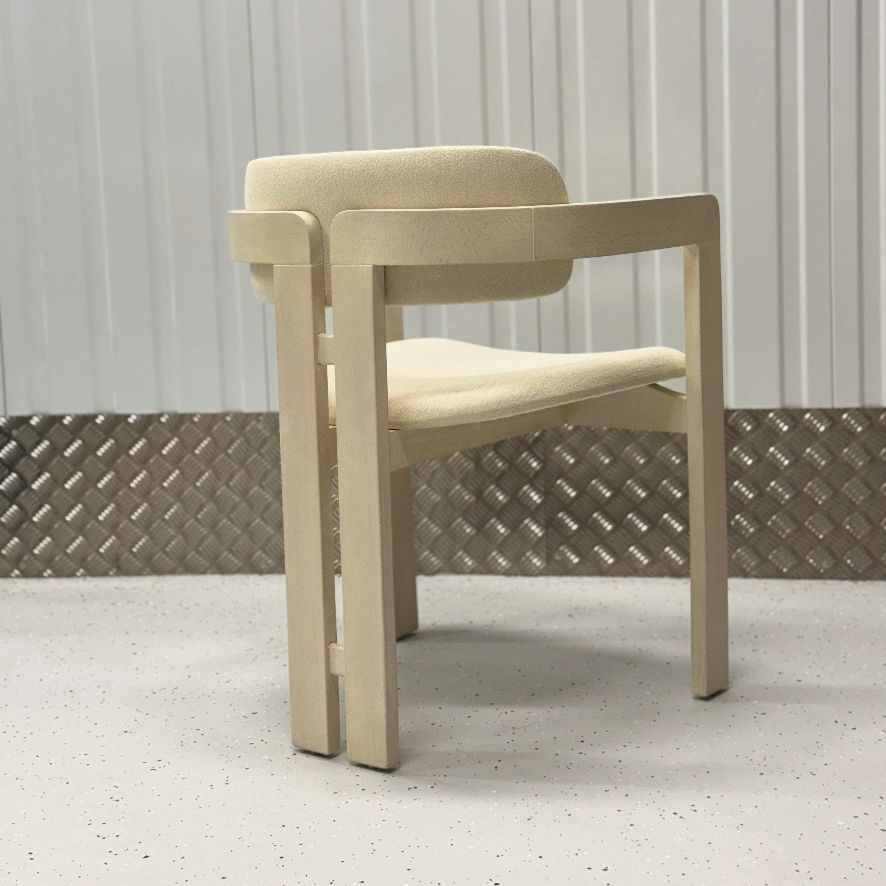 Mid-Century Modern-inspired T-Chair offering comfort, style, and personalization for contemporary dining rooms