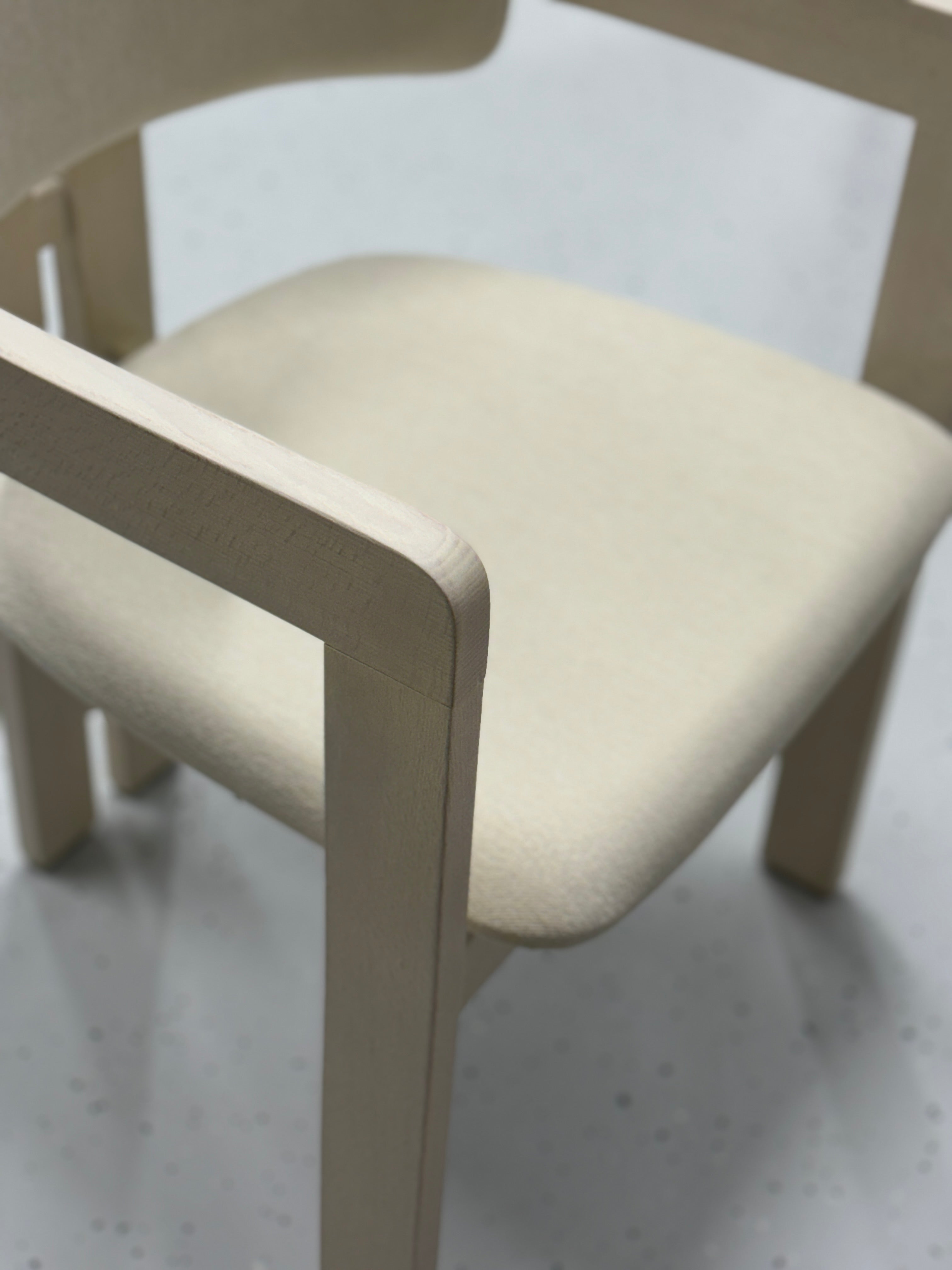 Elegant and versatile T-Chair by BEDÚ Atelier, crafted with premium materials and designed for modern interiors