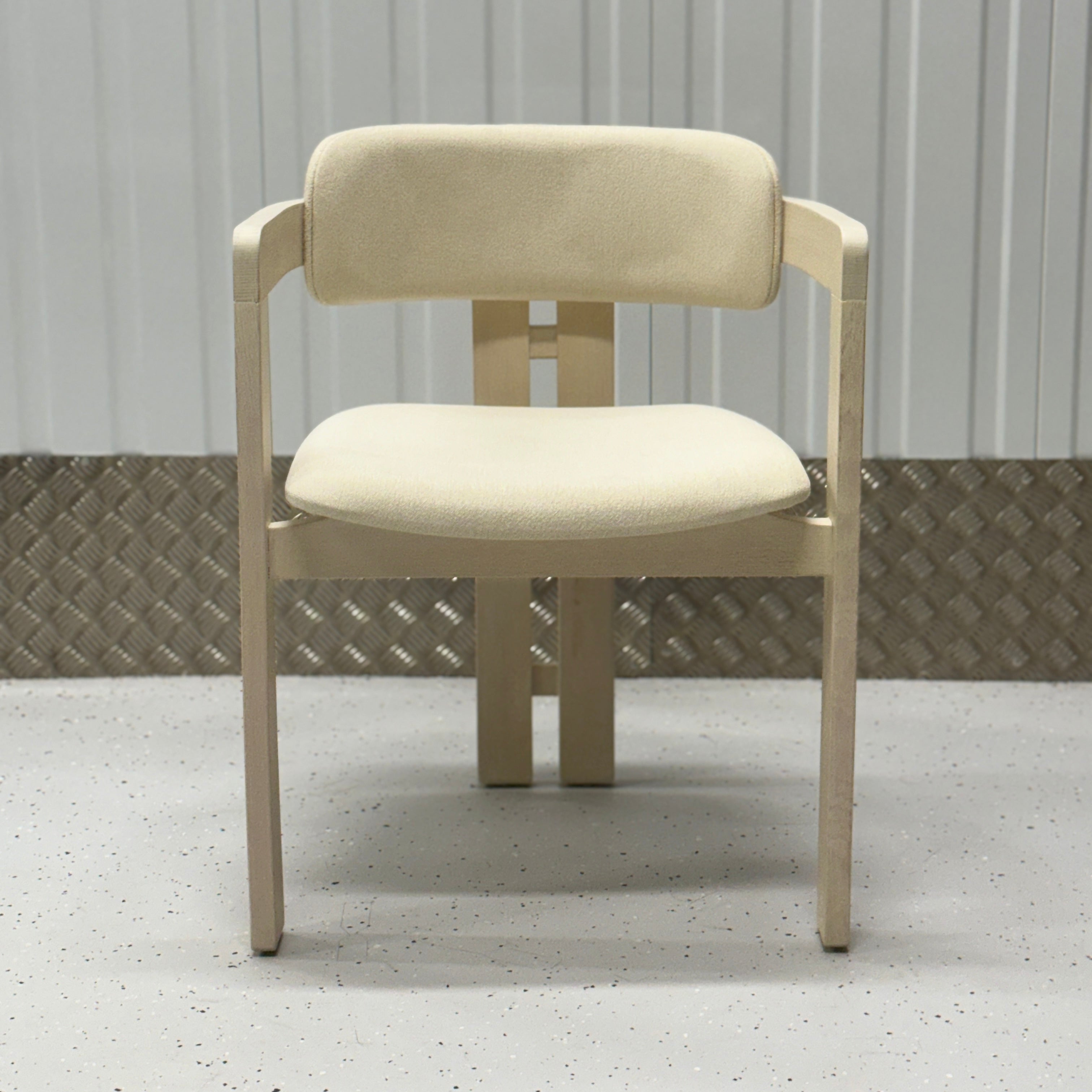 Stylish T-Chair combining a unique T-shaped backrest and premium materials for a luxurious dining experience