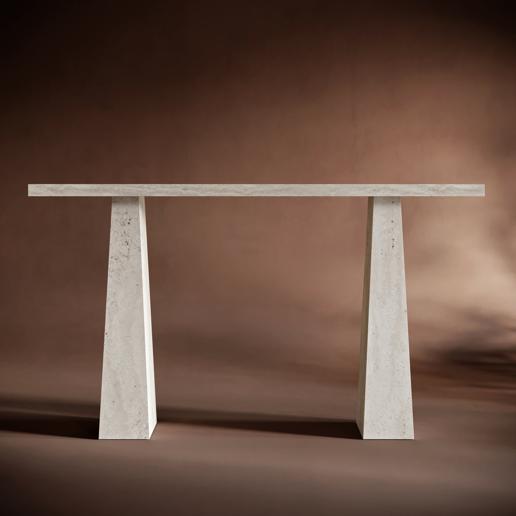 Handcrafted luxury console table with sleek travertine design.
