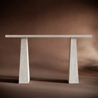 Handcrafted luxury console table with sleek travertine design.
