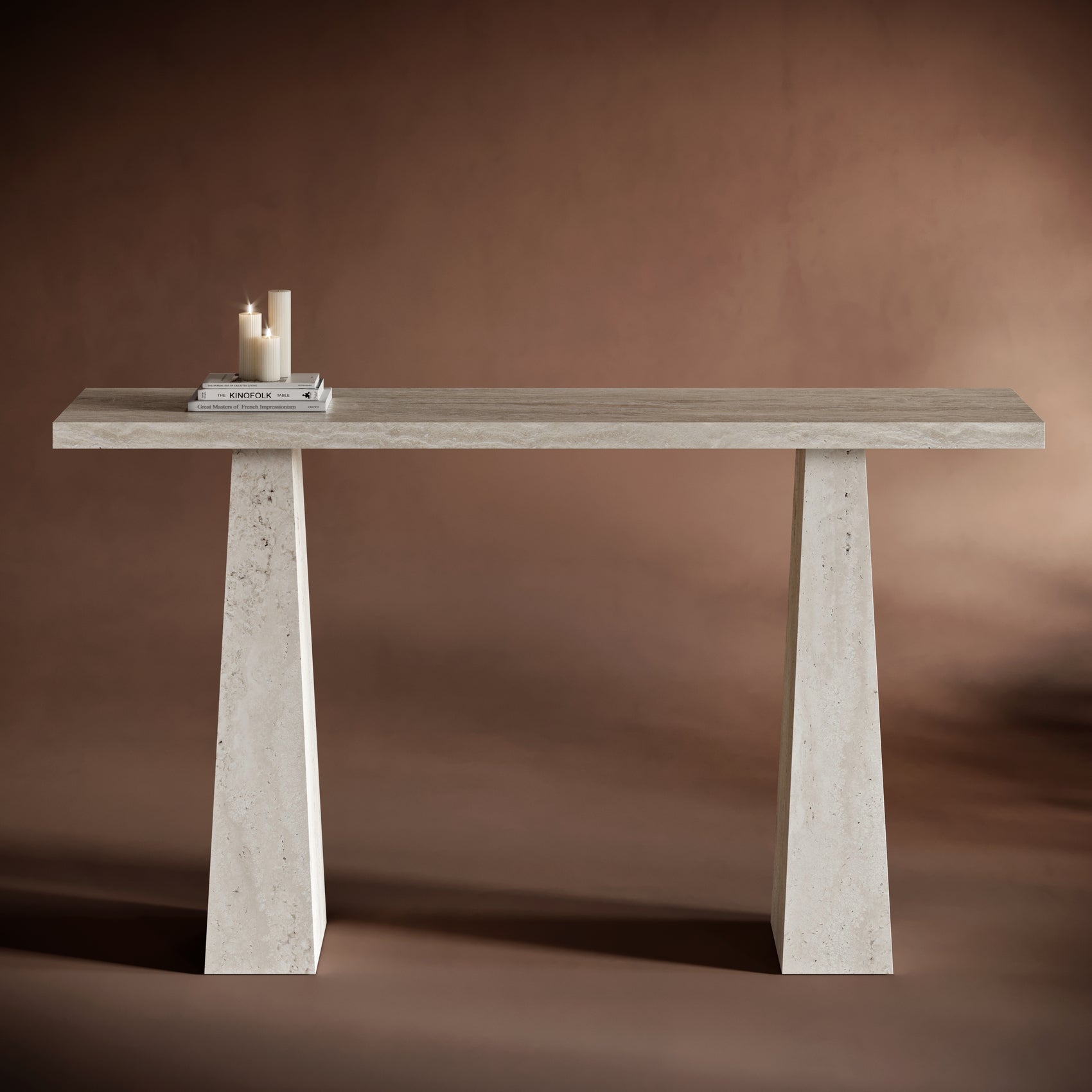 Close-up of ALESSIO travertine console table’s trapezoidal legs and natural stone texture.
