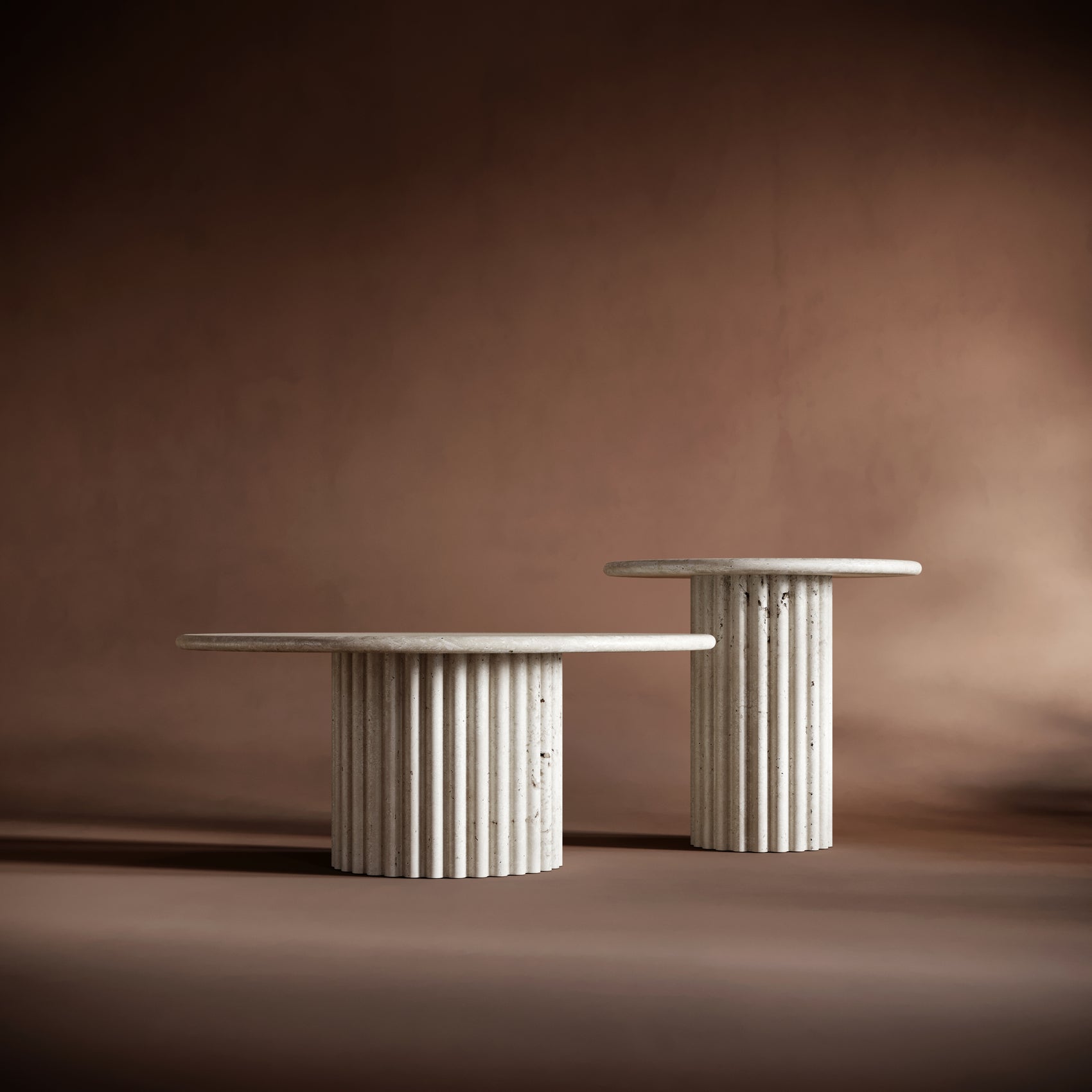 Handcrafted travertine coffee table set showcasing unique textures and timeless design.
