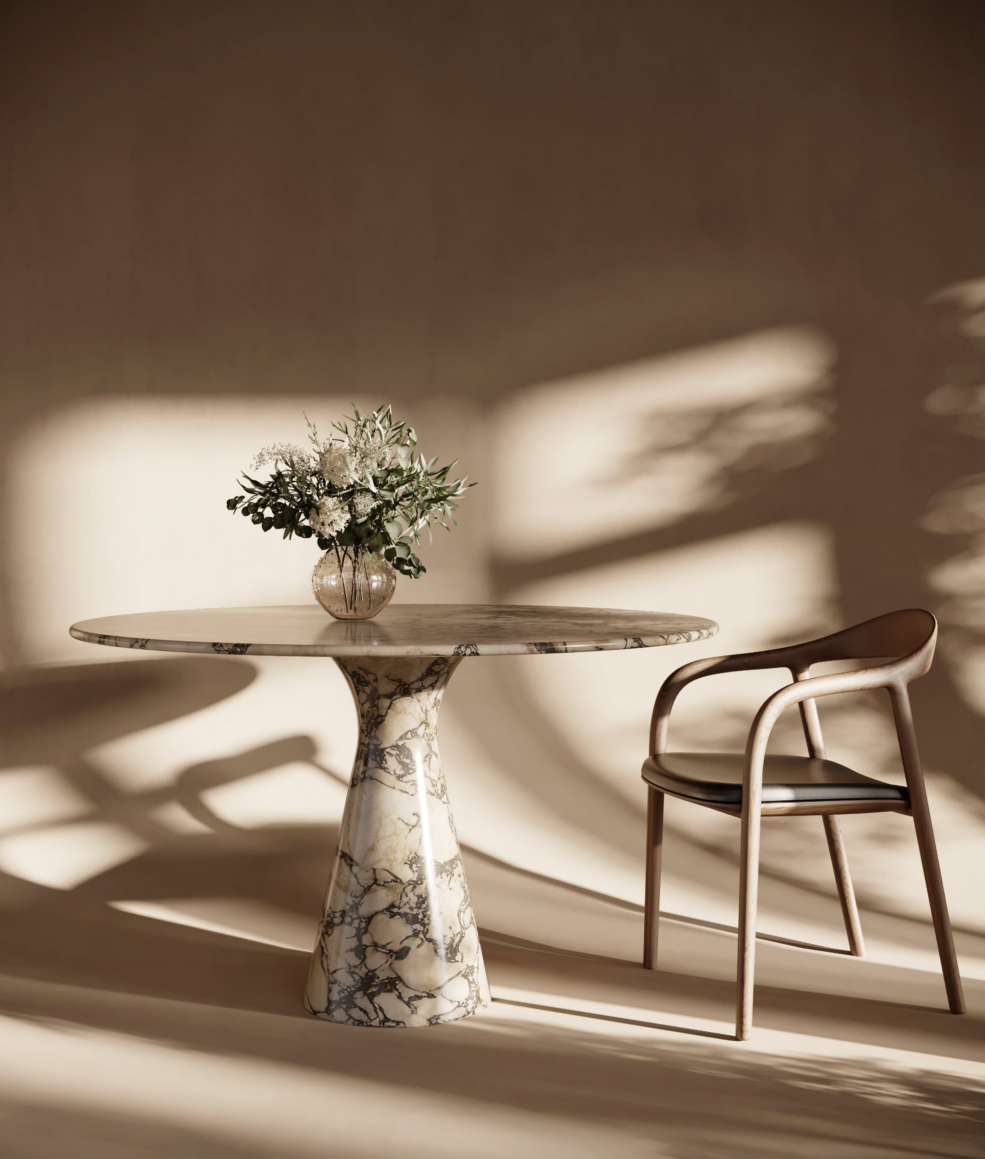 Round Calacatta Viola marble dining table with curved legs, featuring luxurious veining, elegant round marble top, perfect for high-end interiors, classic curved-leg marble table design