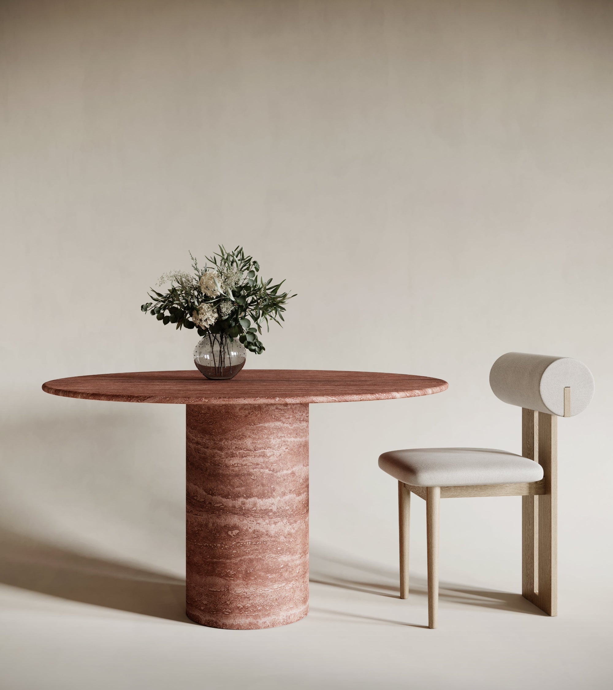 Round red travertine dining table with cylindrical base, rich earthy tones, bold natural stone centerpiece, sculptural travertin table for modern interiors, perfect for elegant dining spaces.