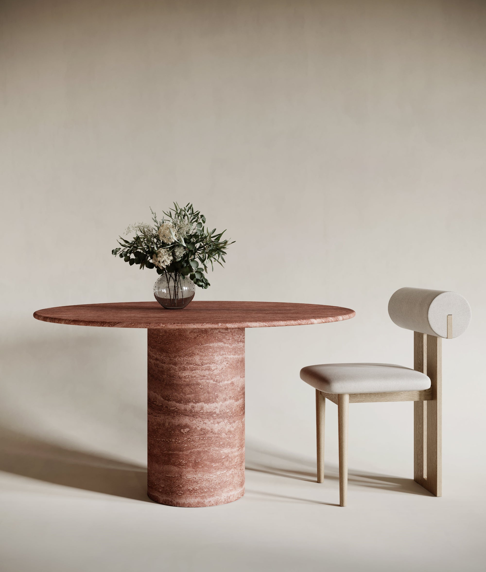 Round red travertine dining table with cylindrical base, rich earthy tones, bold natural stone centerpiece, sculptural travertin table for modern interiors, perfect for elegant dining spaces.