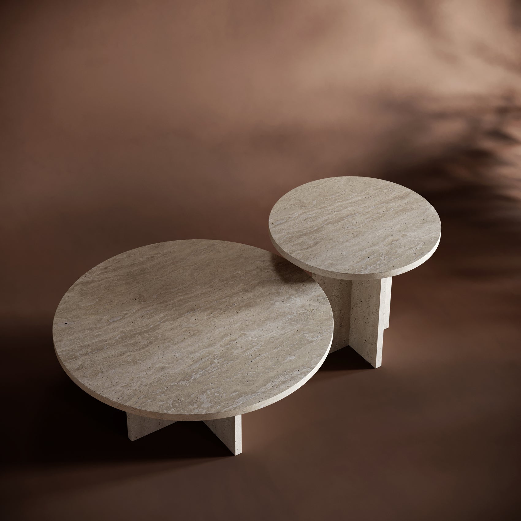 A stunning pair of ELENA travertine coffee tables, featuring natural stone textures and a modern geometric base design.
