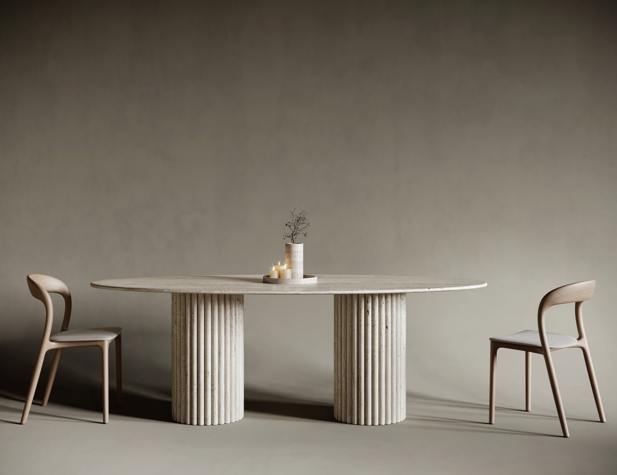 Elegant ellipse travertine dining table with fluted legs, soft oval shape combined with intricate stone detailing, natural texture perfect for refined modern interiors.