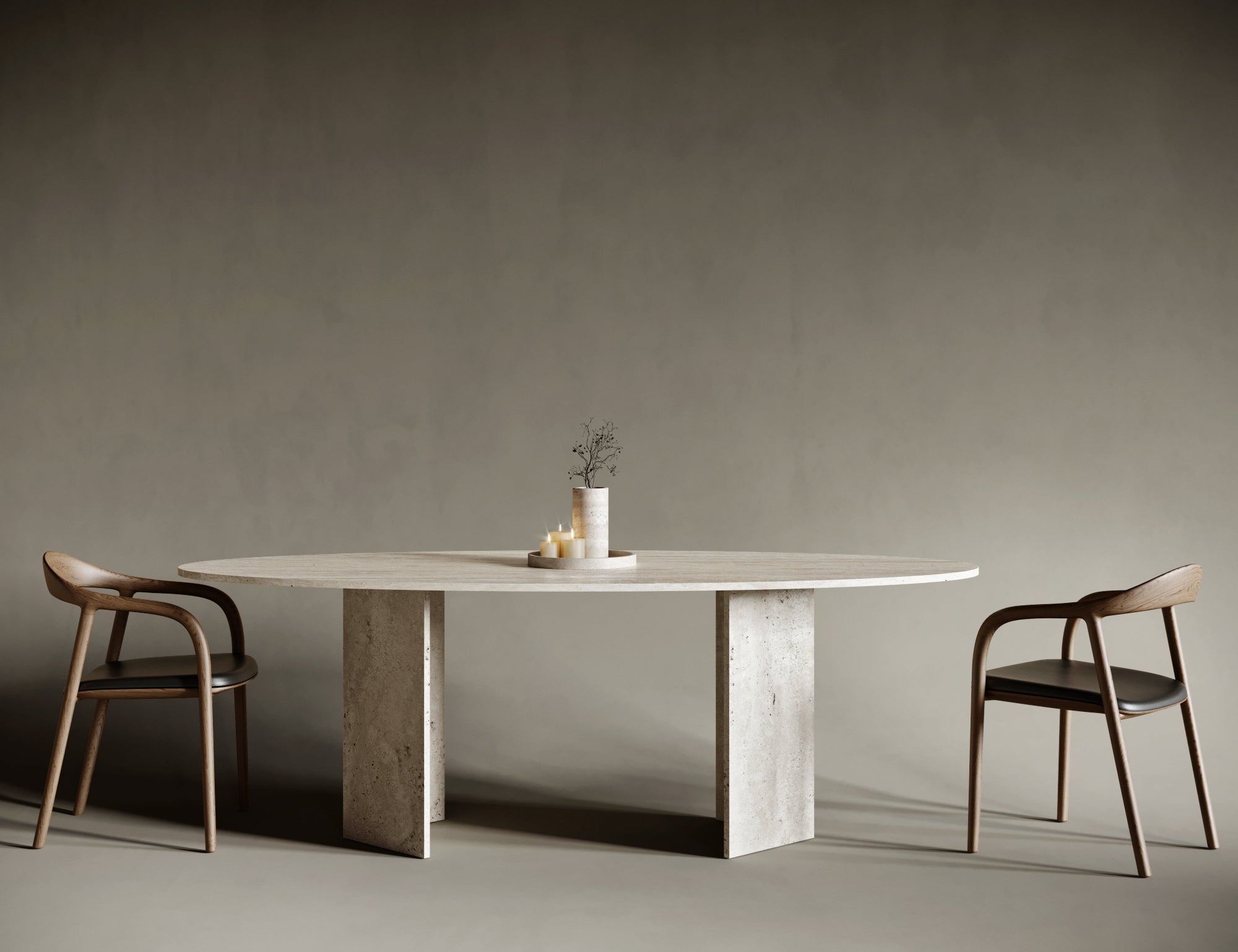 Ellipse travertine dining table with V-shaped legs, minimalist oval form balanced with geometric stone base, perfect for statement modern interiors.
