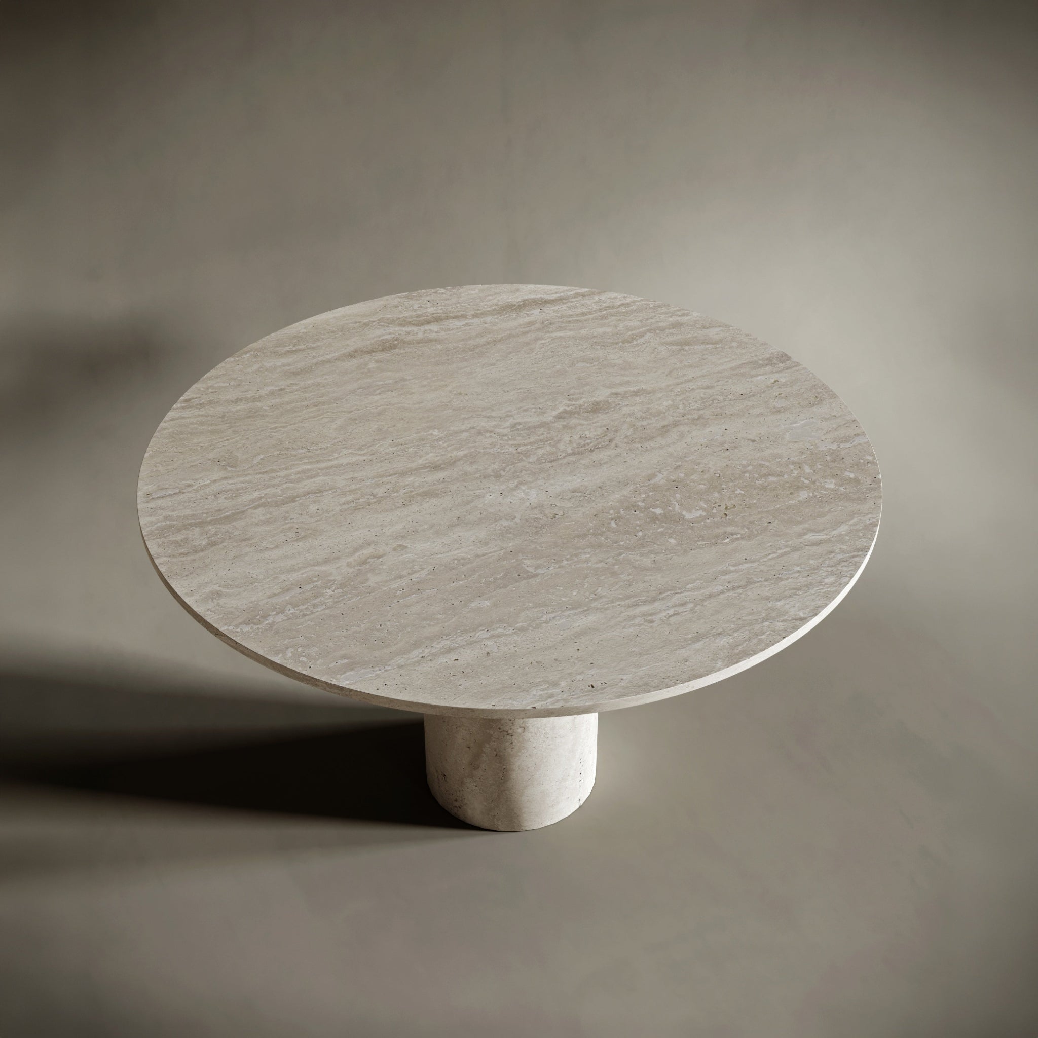 round light travertine dining table