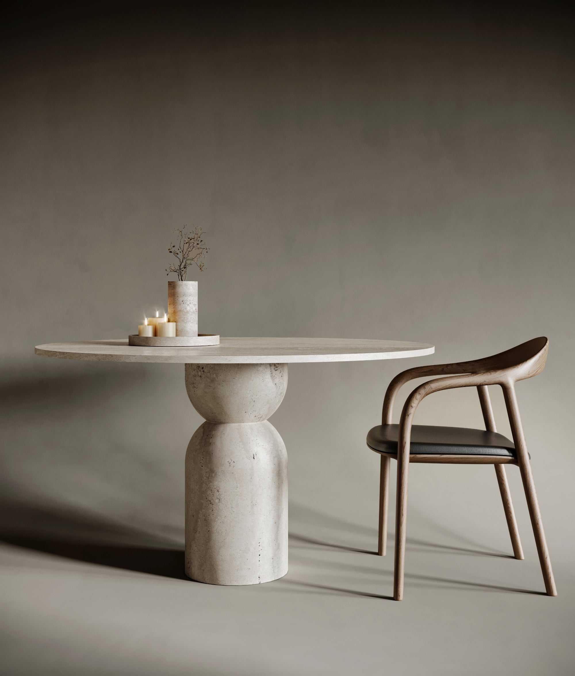 Statement round travertine dining table with an hourglass-shaped base, embodying fluid geometry and balanced tension; crafted from richly textured stone, this piece merges sculptural form with functional design