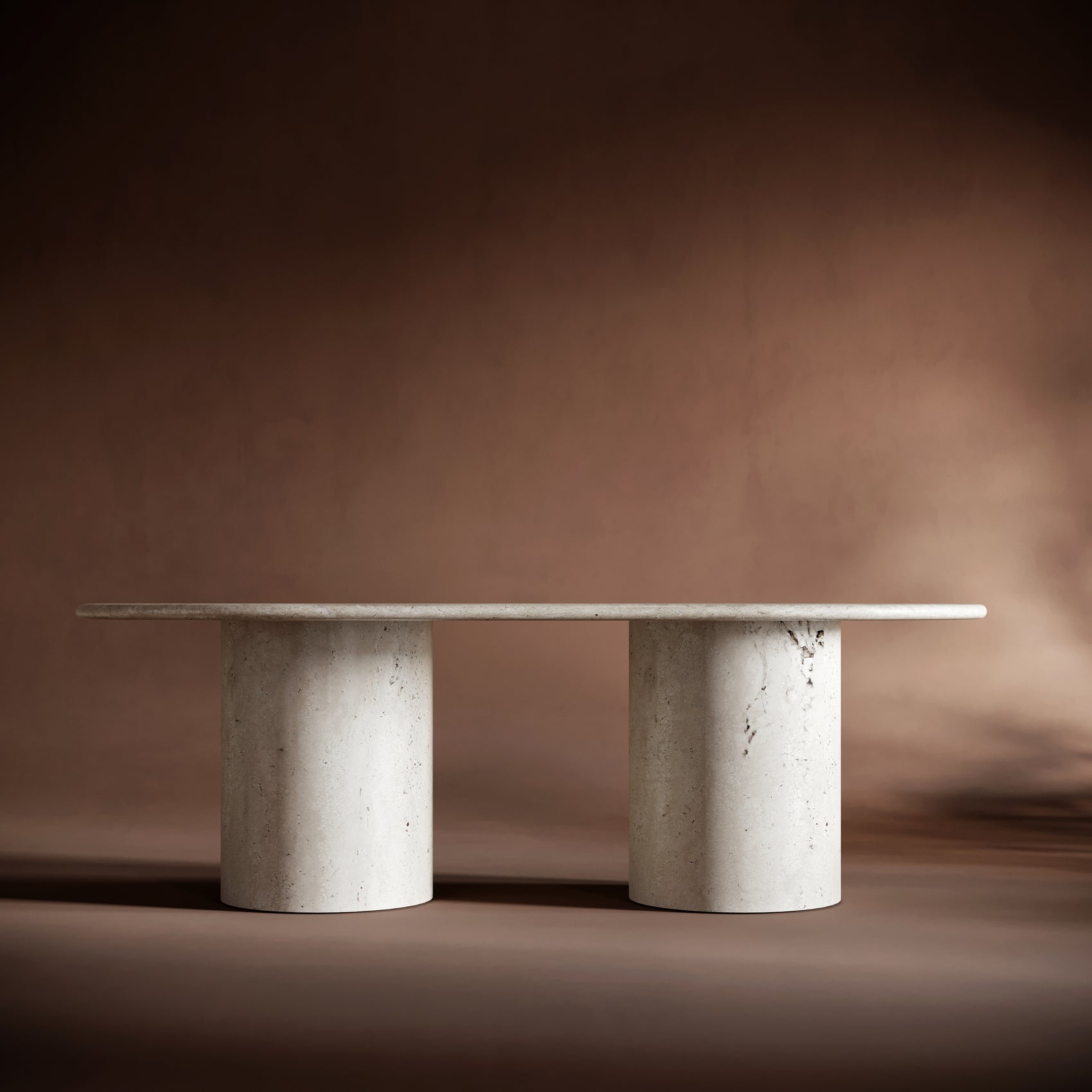 Handcrafted travertine coffee table with smooth surfaces and earthy tones, perfect for modern spaces.
