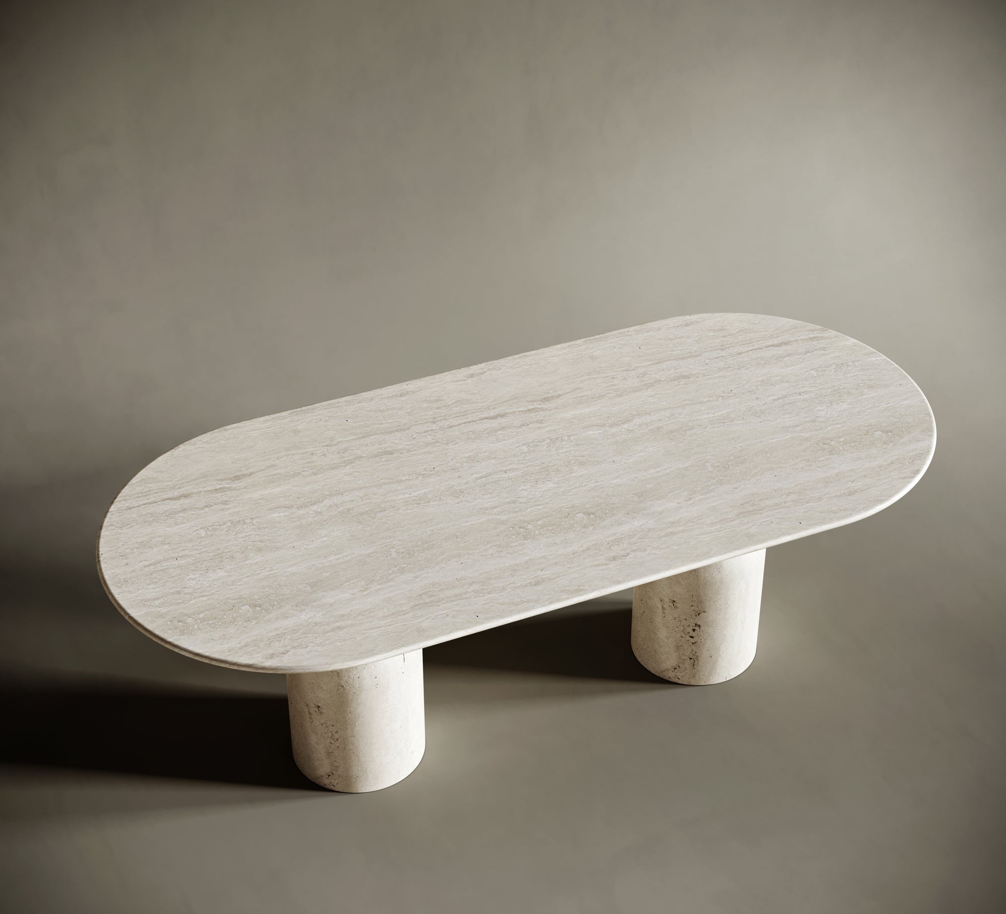 Detailed view of the hourglass-shaped travertine legs of an oval dining table, showcasing their sculptural elegance and solid craftsmanship. The natural stone texture adds depth and character to this luxurious design.
