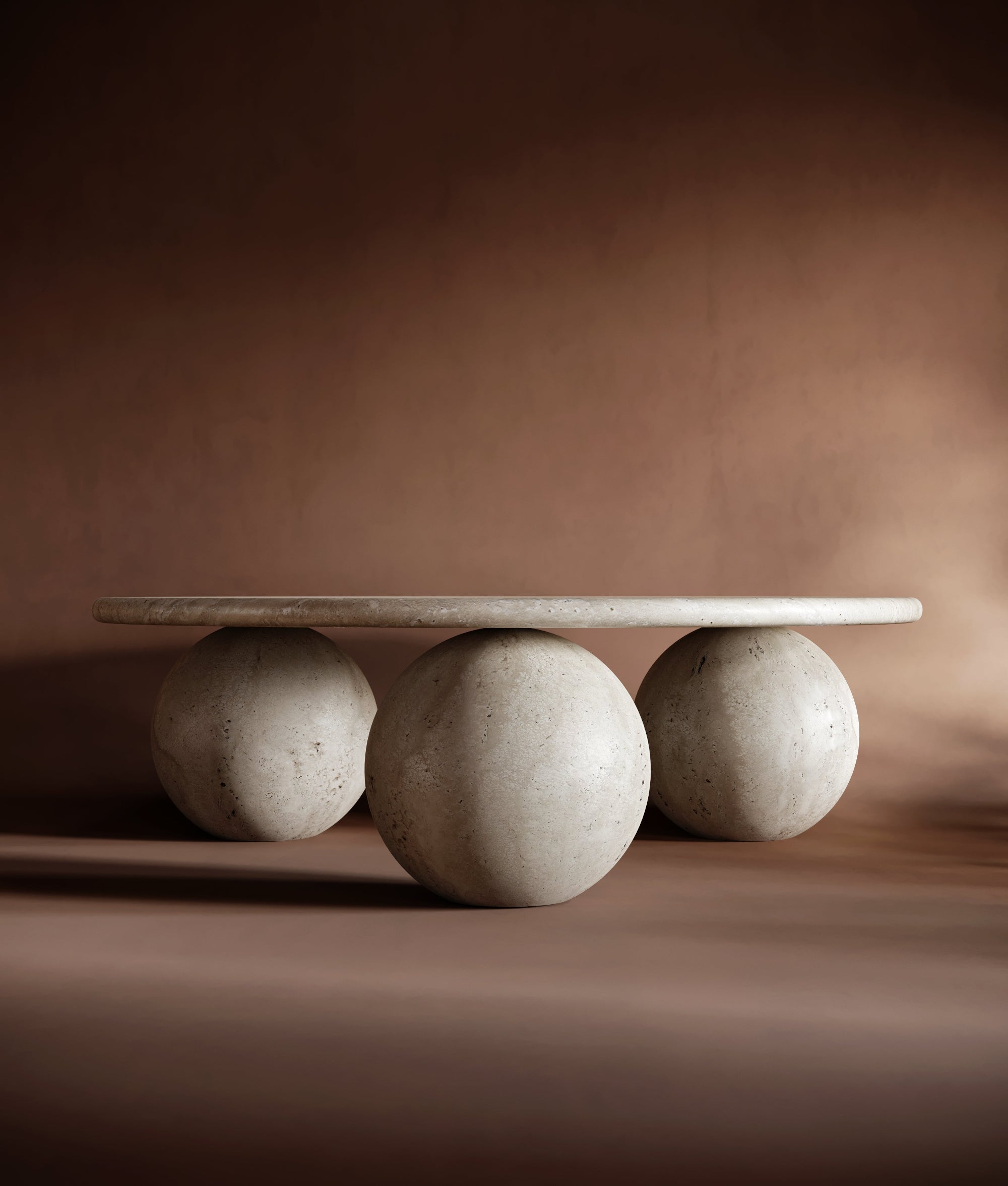 Round travertine coffee table with three ball base, sculptural modern design, stone center table look, 3 ball travertin style, natural finish for elegant interiors.