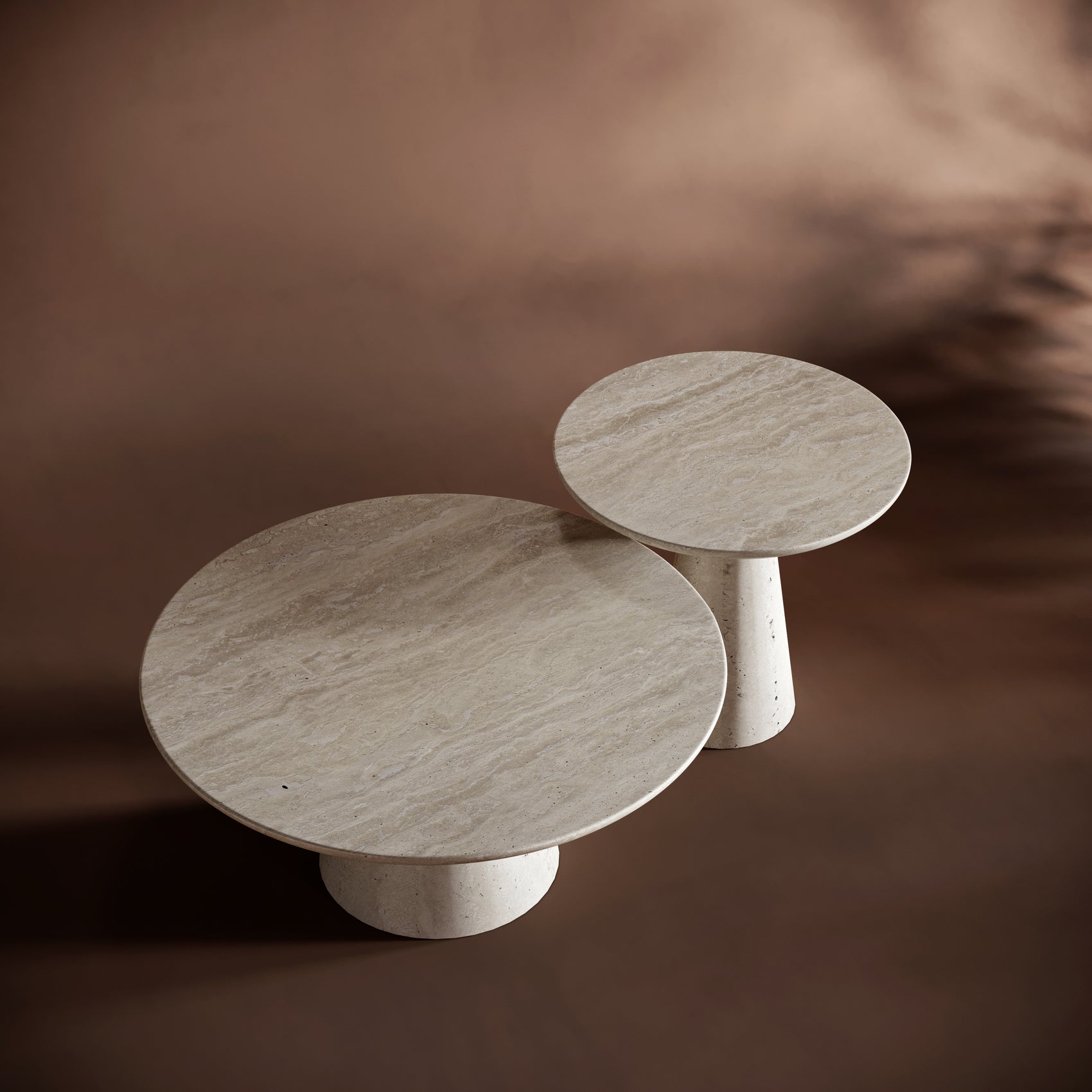 Premium travertine coffee table set with warm earthy tones, perfect for modern and Nordic-inspired spaces.
