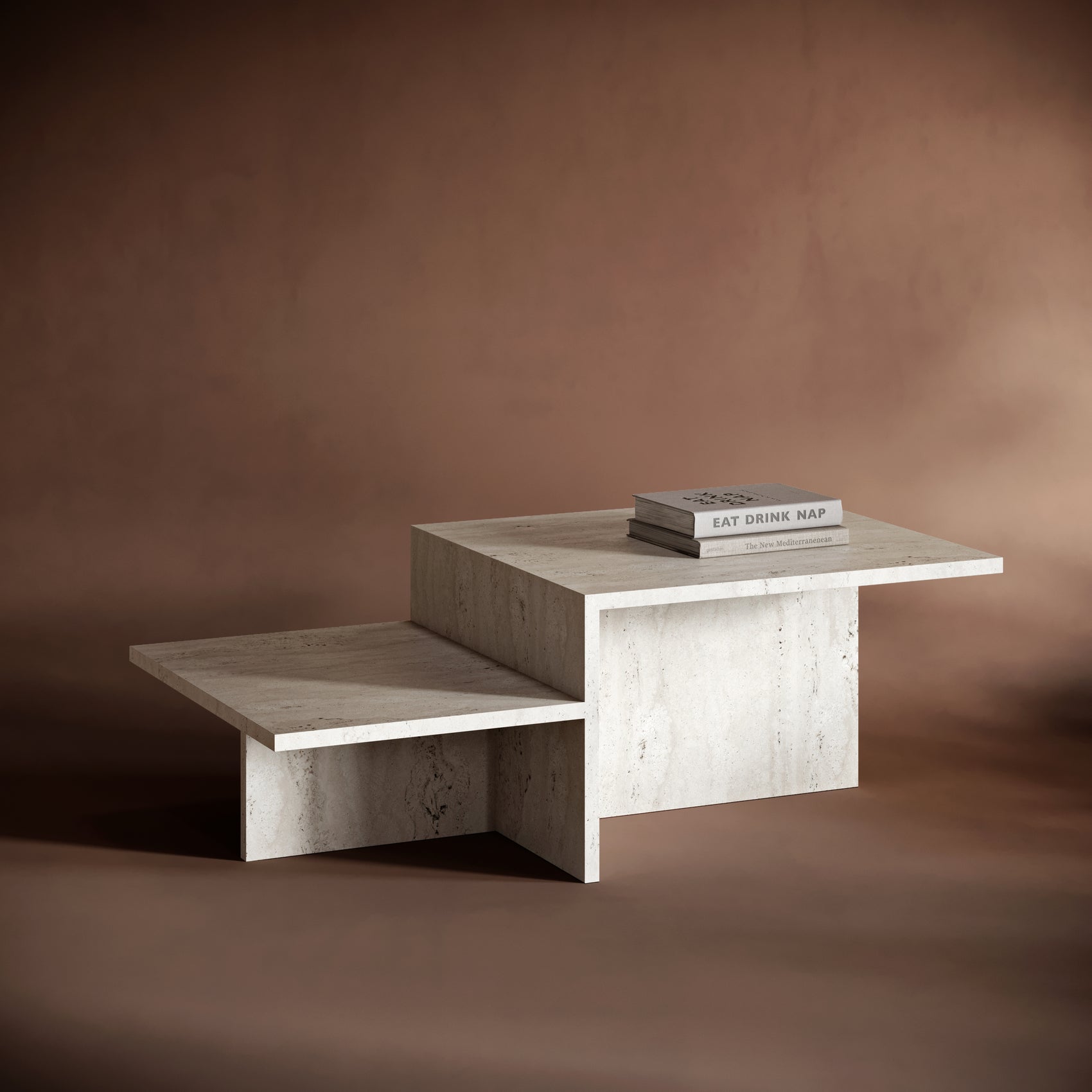 Ferm Living travertine coffee table :A modern, multi-level travertine coffee table with a natural stone texture, shown against a neutral background.